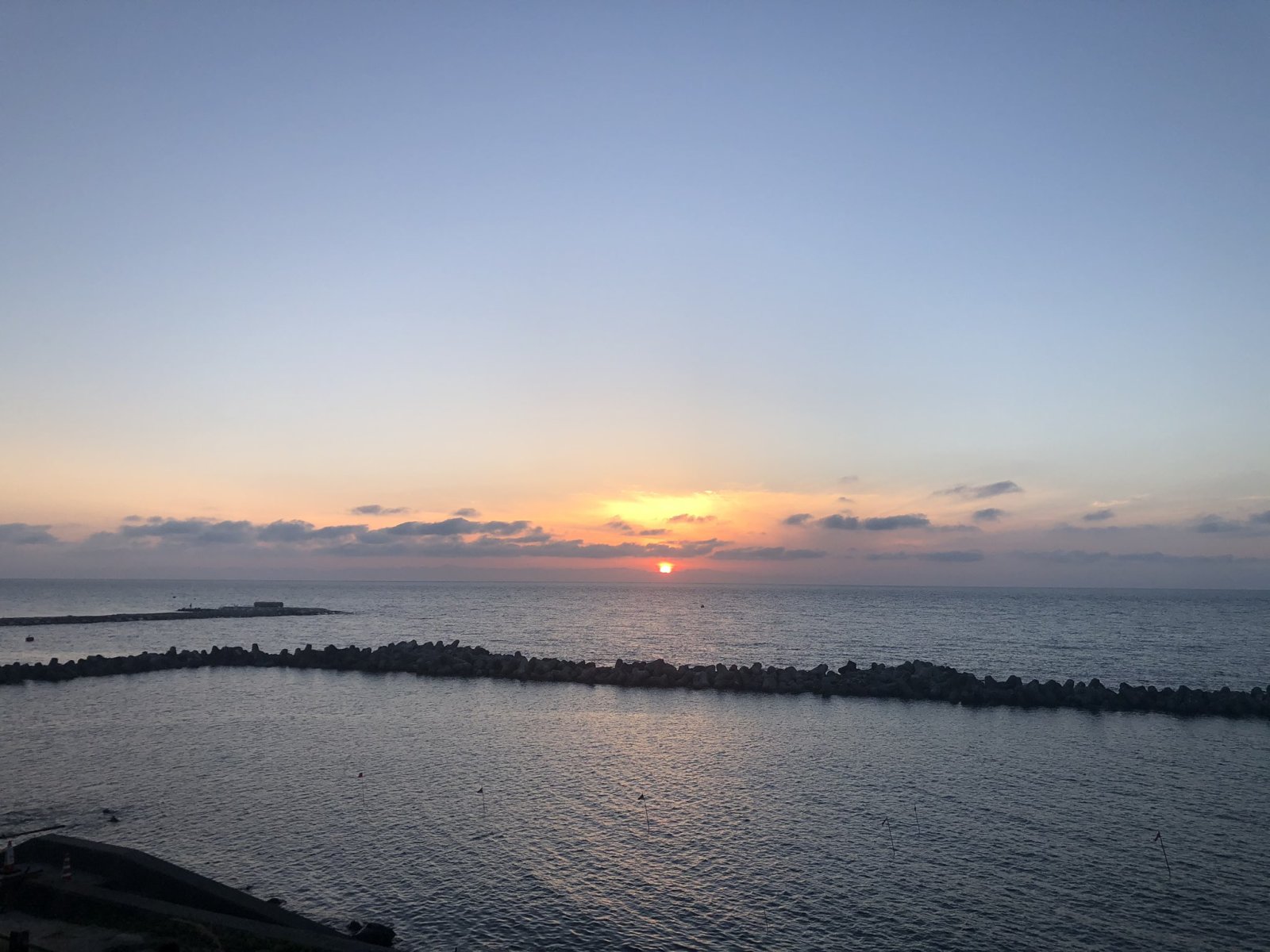 フラー株式会社_日本海夕日